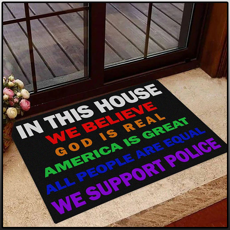 In this house we believe god is real american is great all people are equal we support police doormat 1
