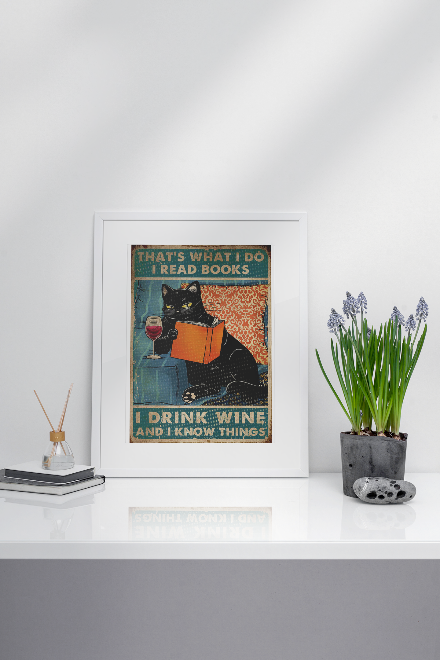 CatThat'swhatIdoIreadbooksIdrinkwineandIknowthingsposter